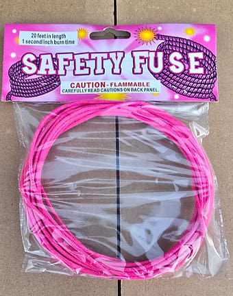 Flammable safety fuse in plastic wrap